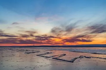 Hopskjuten is i solnedgången, Norra Kvarken, mars 2020.
