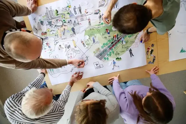 Personer deltar i en workshop.